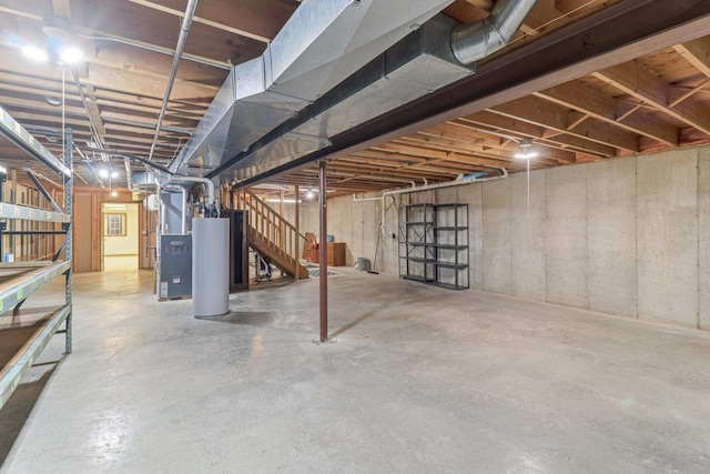 35932 N Watson Ave, Ingleside, IL 60041 - unfinished basement with stairs, heating unit, and water heater