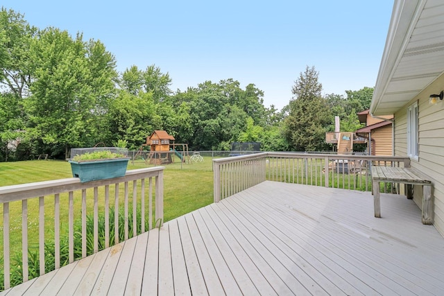 35932 N Watson Ave, Ingleside, IL 60041 - wooden terrace with a playground, a fenced backyard, and view of wooded area