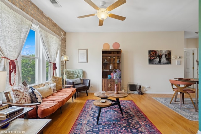 6100 N Rockwell St Unit 3S, Chicago, IL 60659 - living room featuring ceiling fan, wood finished floors, and baseboards