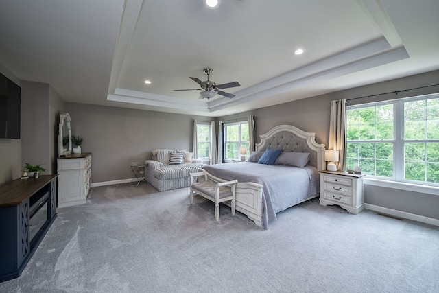 3095 Long Common Pkwy, Elgin, IL 60124 - bedroom with a raised ceiling, carpet floors, multiple windows, a ceiling fan, and recessed lighting