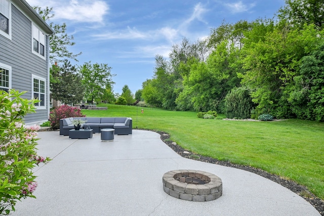 3095 Long Common Pkwy, Elgin, IL 60124 - view of patio featuring an outdoor living space with a fire pit and view of wooded area