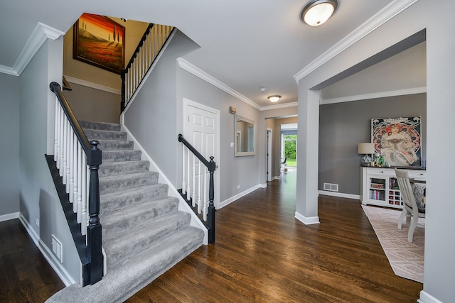 3095 Long Common Pkwy, Elgin, IL 60124 - foyer featuring wood finished floors, stairway, and crown molding