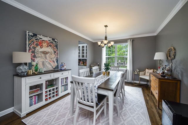 3095 Long Common Pkwy, Elgin, IL 60124 - dining space with a chandelier, crown molding, and dark wood-style flooring
