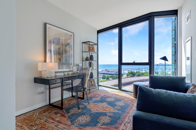 211 N Harbor Dr Unit 1902, Chicago, IL 60601 - office featuring floor to ceiling windows, a water view, and baseboards