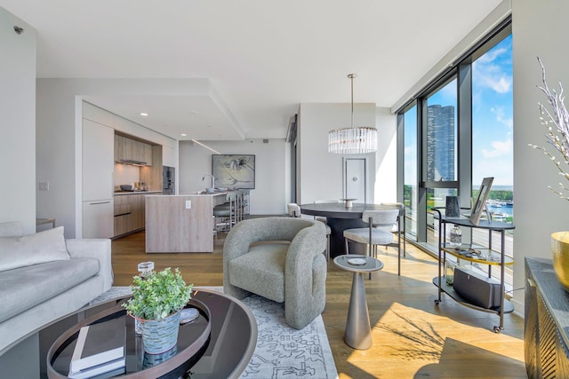 211 N Harbor Dr Unit 1902, Chicago, IL 60601 - living room featuring wood finished floors and a chandelier