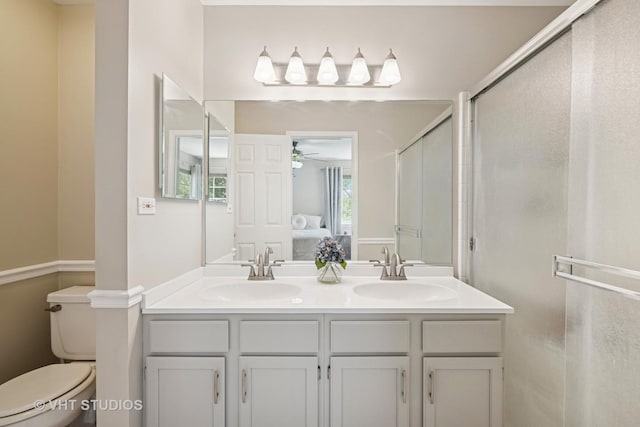 4643 Rolling Hills Dr, Lake In The Hills, IL 60156 - bathroom featuring a stall shower, double vanity, and ceiling fan