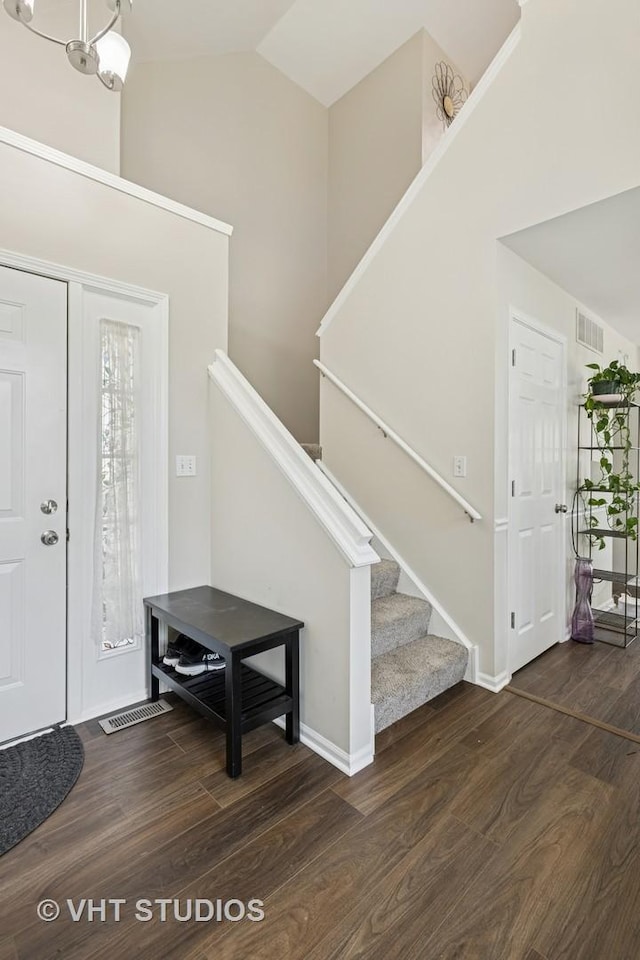 4643 Rolling Hills Dr, Lake In The Hills, IL 60156 - foyer with stairway, wood finished floors, and high vaulted ceiling
