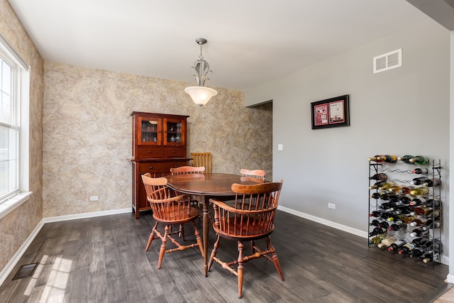 1216 Barlina Rd, Crystal Lake, IL 60014 - dining area with healthy amount of natural light and dark wood-type flooring