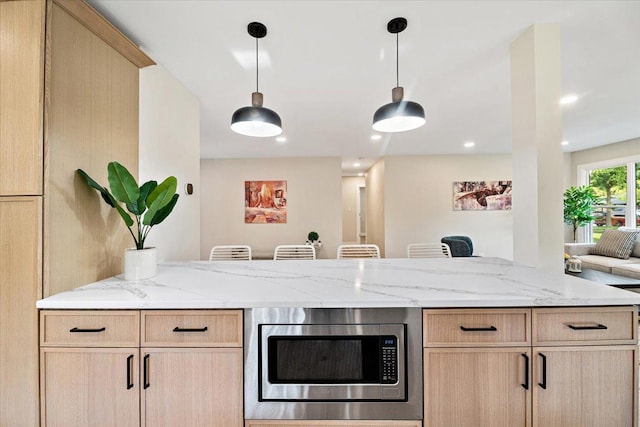 114 S Waverly Pl, Mount Prospect, IL 60056 - kitchen featuring stainless steel microwave, light brown cabinets, light stone counters, and recessed lighting