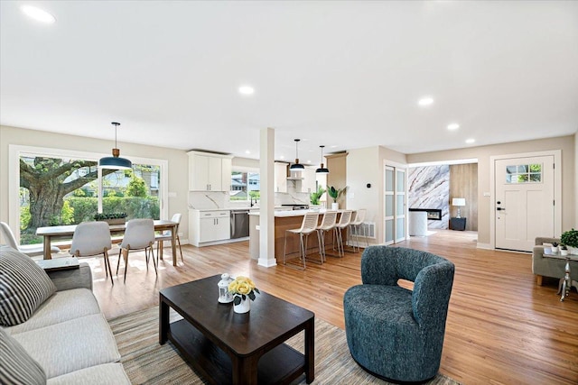 114 S Waverly Pl, Mount Prospect, IL 60056 - living room with light wood-type flooring and recessed lighting