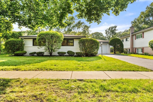114 S Waverly Pl, Mount Prospect, IL 60056 - view of front of house featuring a front yard and a garage