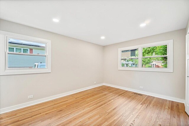 114 S Waverly Pl, Mount Prospect, IL 60056 - unfurnished room with light wood-style floors and recessed lighting