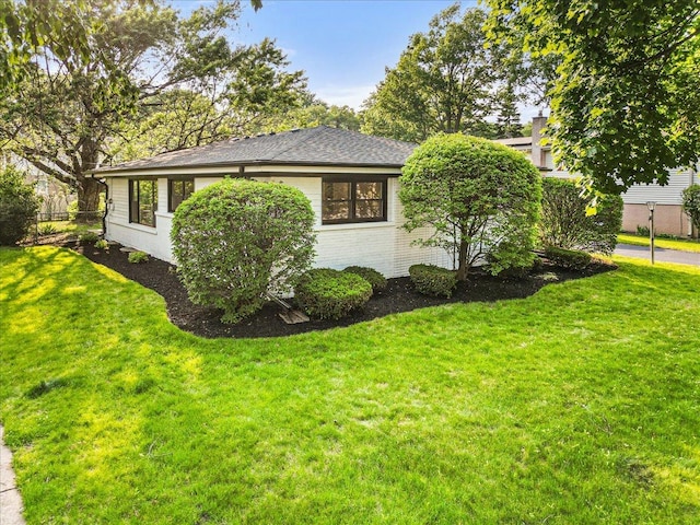 114 S Waverly Pl, Mount Prospect, IL 60056 - view of home's exterior with a yard and brick siding