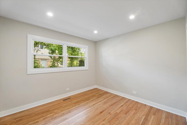 114 S Waverly Pl, Mount Prospect, IL 60056 - spare room featuring light wood-style flooring and recessed lighting