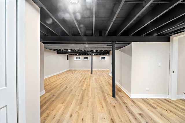 114 S Waverly Pl, Mount Prospect, IL 60056 - basement with wood finished floors and baseboards