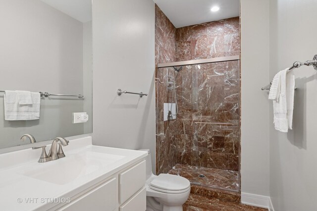 1645 W Erie St Unit 2, Chicago, IL 60622 - bathroom featuring vanity, a stall shower, and recessed lighting