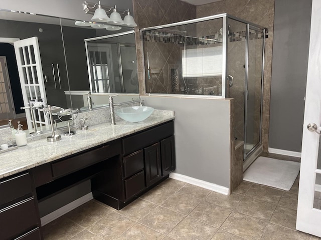 4429 203rd St, Matteson, IL 60443 - bathroom featuring vanity, a stall shower, tile patterned floors, and baseboards