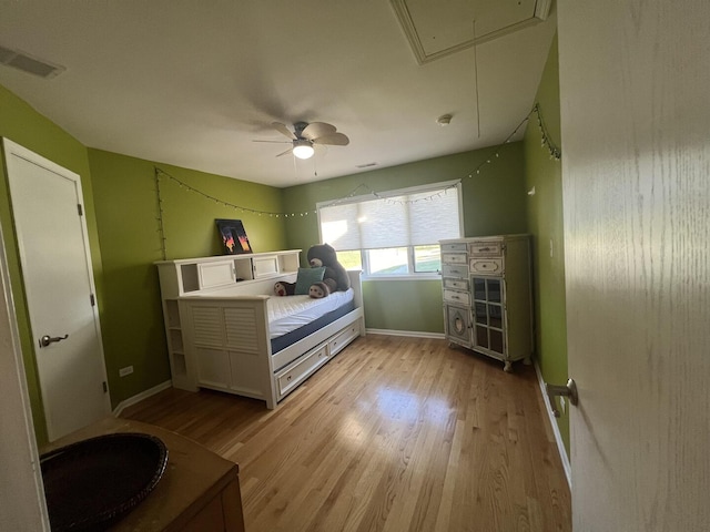 4429 203rd St, Matteson, IL 60443 - bedroom with attic access, light wood-style floors, baseboards, and a ceiling fan