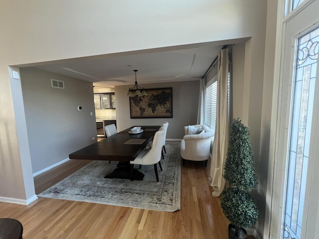 4429 203rd St, Matteson, IL 60443 - dining space featuring wood finished floors, baseboards, and healthy amount of natural light