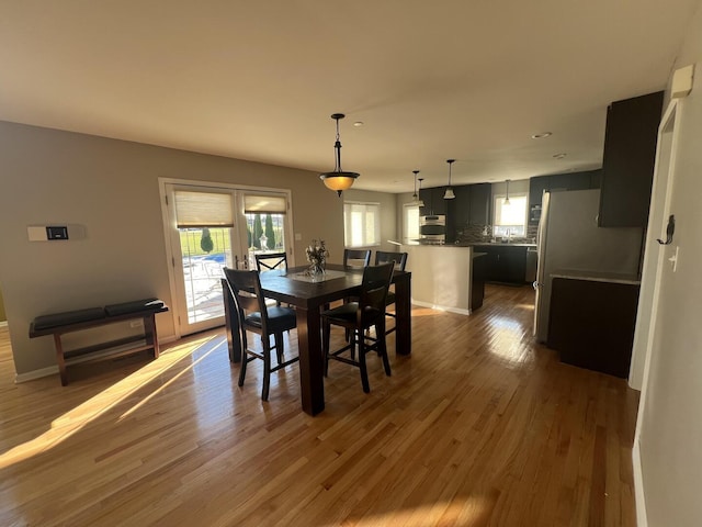 4429 203rd St, Matteson, IL 60443 - dining space featuring wood finished floors, baseboards, and recessed lighting