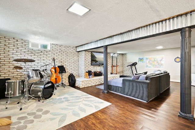 41W822 Burlington Rd, Saint Charles, IL 60175 - living room featuring wood finished floors, a textured ceiling, and brick wall