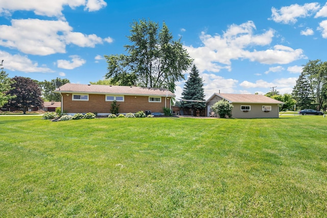 41W822 Burlington Rd, Saint Charles, IL 60175 - view of property exterior with a lawn and brick siding