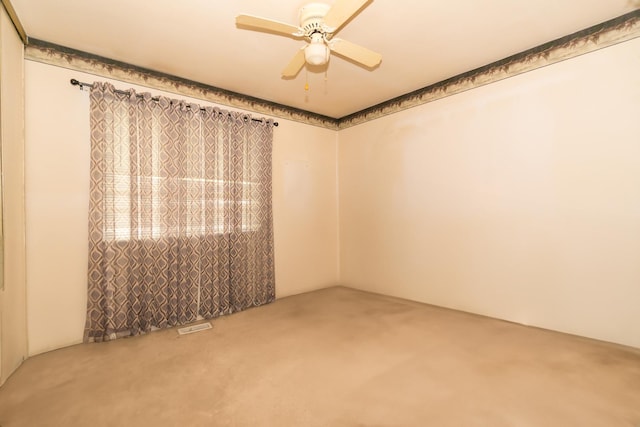 215 Chase Ct, Bolingbrook, IL 60440 - carpeted empty room featuring a ceiling fan