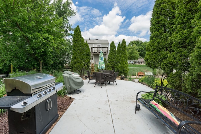 215 Chase Ct, Bolingbrook, IL 60440 - view of patio with grilling area, outdoor dining space, and view of scattered trees