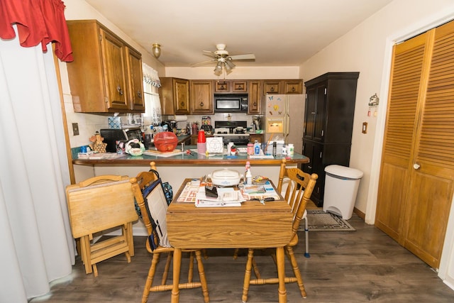 215 Chase Ct, Bolingbrook, IL 60440 - dining area featuring a ceiling fan and dark wood-type flooring