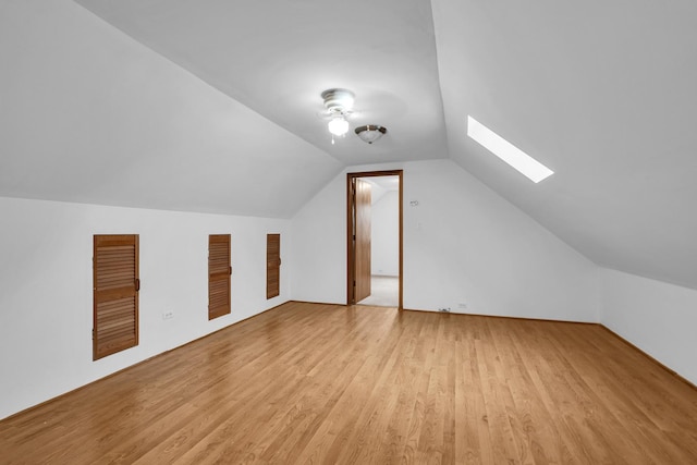 3134 N New England Ave, Chicago, IL 60634 - bonus room with a skylight, vaulted ceiling, and light wood finished floors