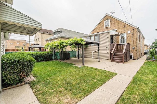 3134 N New England Ave, Chicago, IL 60634 - view of front of home with a gazebo, brick siding, and a front yard