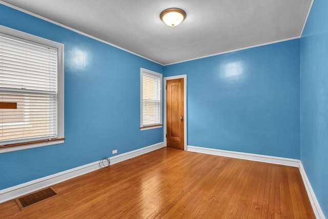 3134 N New England Ave, Chicago, IL 60634 - unfurnished room featuring hardwood / wood-style floors and ornamental molding