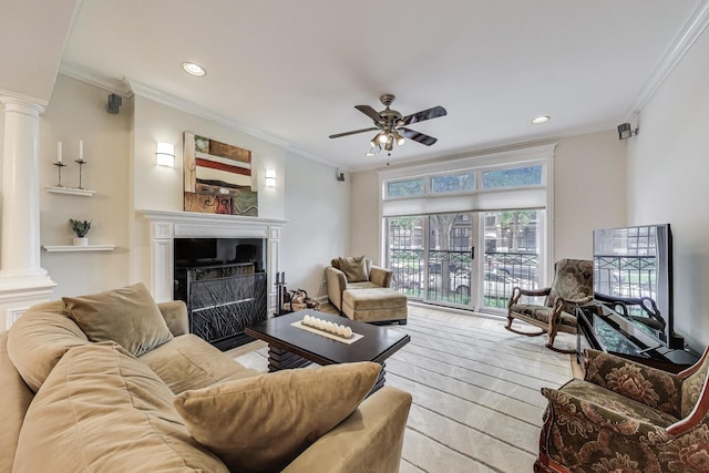 5021 N Kenmore Ave Unit 1S, Chicago, IL 60640 - living room featuring decorative columns, ornamental molding, a ceiling fan, recessed lighting, and a fireplace