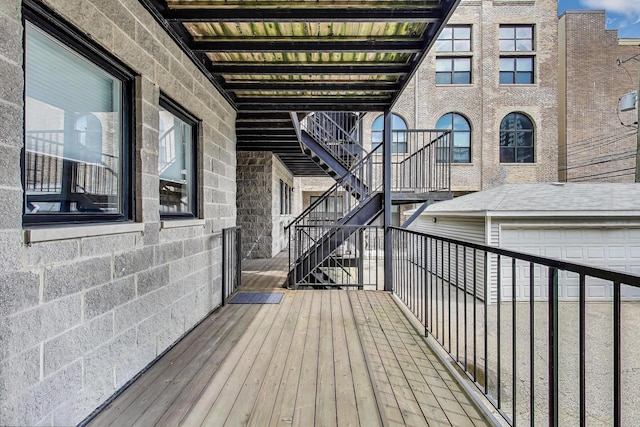5021 N Kenmore Ave Unit 1S, Chicago, IL 60640 - wooden terrace featuring stairway