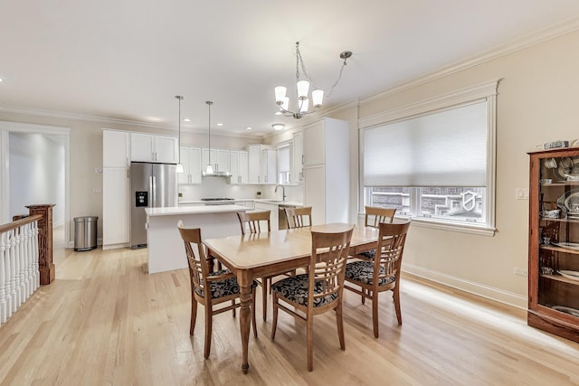 5021 N Kenmore Ave Unit 1S, Chicago, IL 60640 - dining room featuring a chandelier, light wood-style flooring, ornamental molding, and recessed lighting