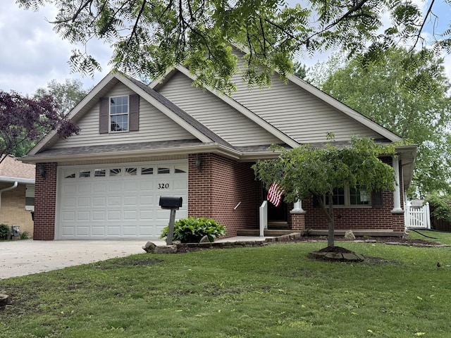320 S Marguerite St, Coal City, IL 60416 - view of front facade with driveway, brick siding, and a front lawn