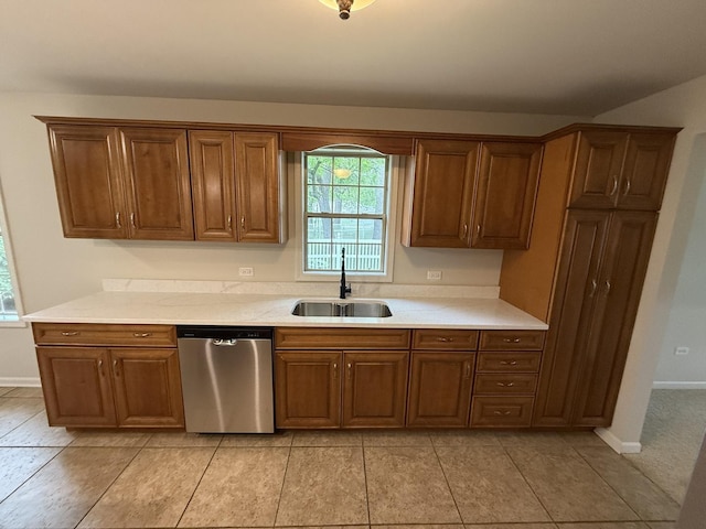320 S Marguerite St, Coal City, IL 60416 - kitchen featuring stainless steel dishwasher, a sink, light countertops, and brown cabinets