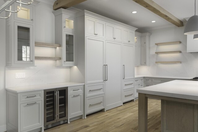 845 Tulip Ln, Naperville, IL 60540 - kitchen with open shelves, beverage cooler, decorative backsplash, light wood-style flooring, and beam ceiling