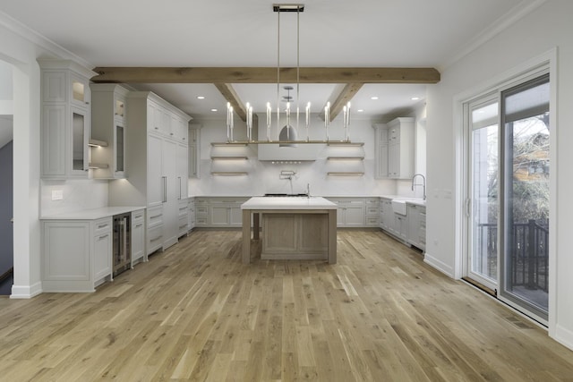 845 Tulip Ln, Naperville, IL 60540 - kitchen featuring wine cooler, light wood-style floors, backsplash, light countertops, and beamed ceiling