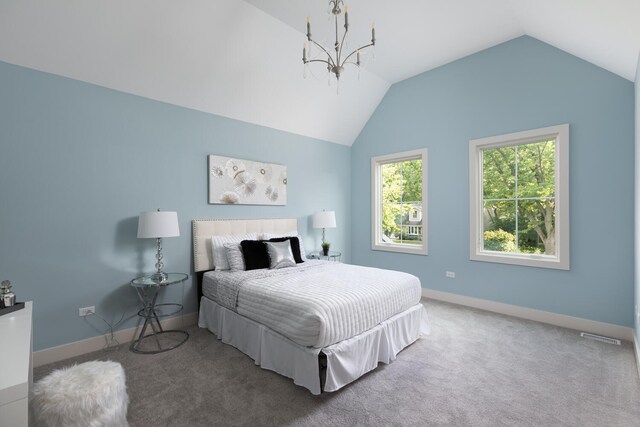 845 Tulip Ln, Naperville, IL 60540 - carpeted bedroom with lofted ceiling, baseboards, and a chandelier