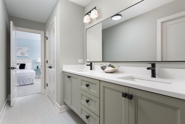 845 Tulip Ln, Naperville, IL 60540 - full bath featuring double vanity, tile patterned floors, baseboards, and ensuite bathroom