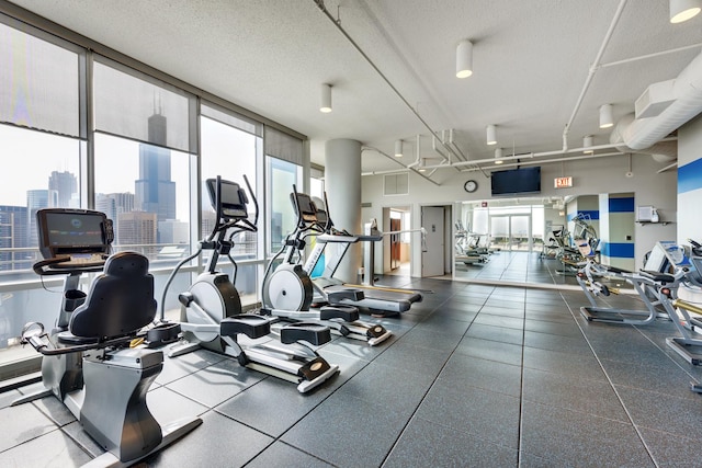workout area with a textured ceiling