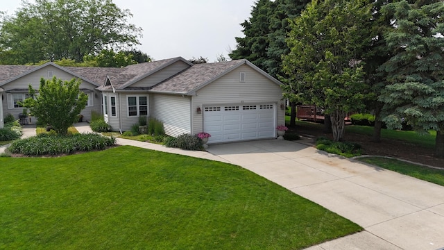 873 Beauchamp Ave, Manteno, IL 60950 - ranch-style home featuring a garage, driveway, a front lawn, and roof with shingles