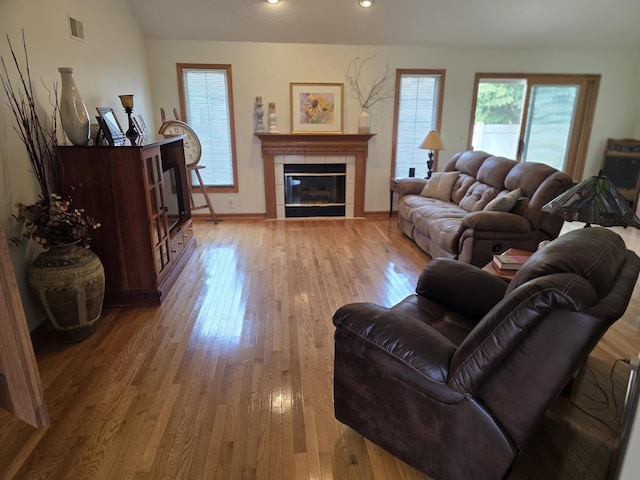873 Beauchamp Ave, Manteno, IL 60950 - living area with wood-type flooring, recessed lighting, and a tiled fireplace