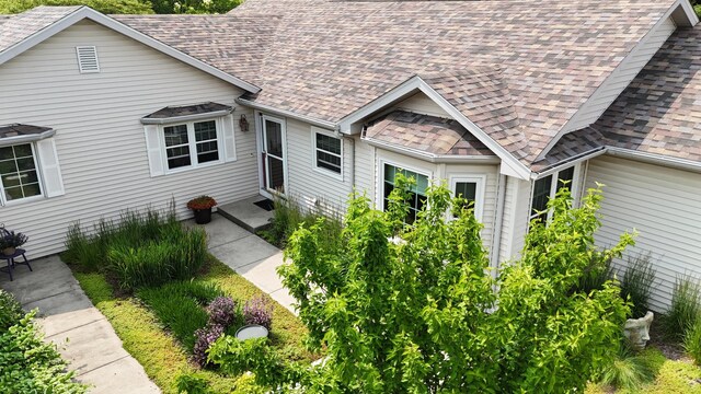 873 Beauchamp Ave, Manteno, IL 60950 - view of home's exterior with a shingled roof