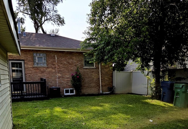 7447 Beloit Ave, Bridgeview, IL 60455 - rear view of house featuring a shingled roof and brick siding