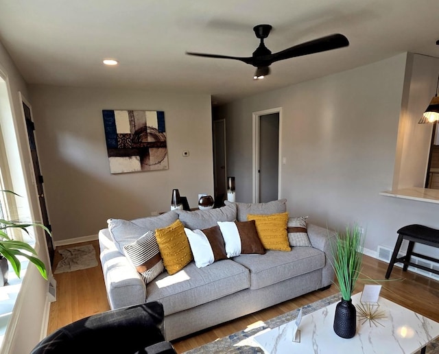 7447 Beloit Ave, Bridgeview, IL 60455 - living room featuring a ceiling fan, recessed lighting, and wood finished floors