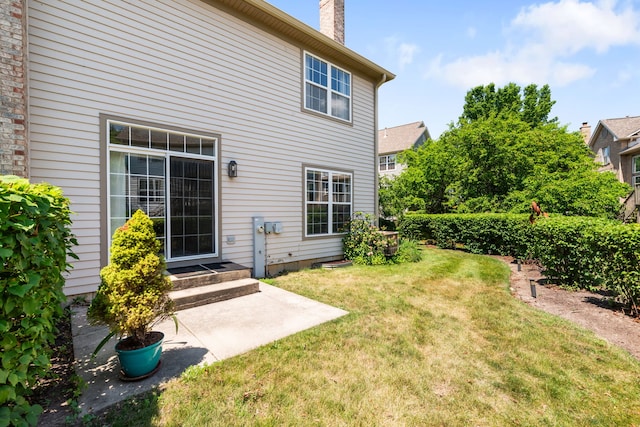 2119 Ivy Ridge Dr Unit 2119, Hoffman Estates, IL 60192 - view of green lawn with a patio area and entry steps