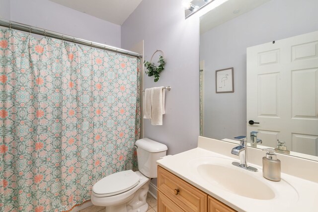 620 Mchenry Rd Unit 102, Wheeling, IL 60090 - bathroom featuring vanity, a shower with shower curtain, and tile patterned floors