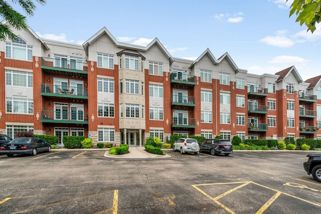 620 Mchenry Rd Unit 102, Wheeling, IL 60090 - view of property with uncovered parking